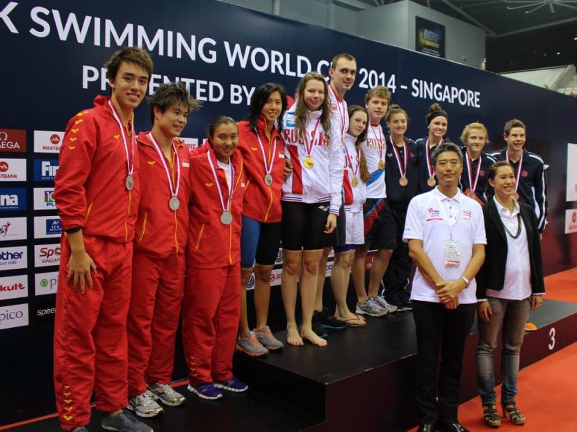 Yakult Singapore, which was a presenting sponsor for the 2014 FINA Mastbank Swimming World Cup in Singapore, has come on board as the Singapore Swimming Association’s largest cash sponsor to date with a three-year agreement worth S$350,000. Photo: Singapore Swimming Association)