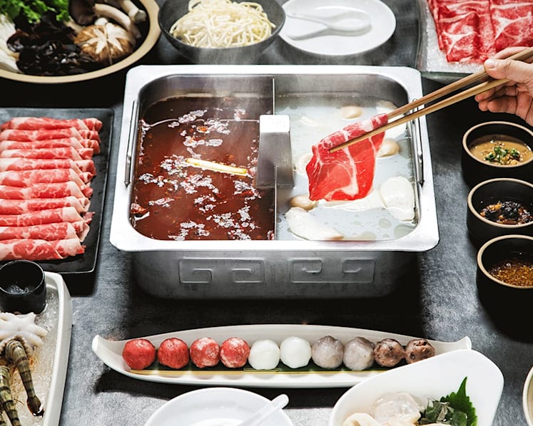 How does Haidilao make its hotpot soups? A look at their central kitchen and smart restaurant in Singapore