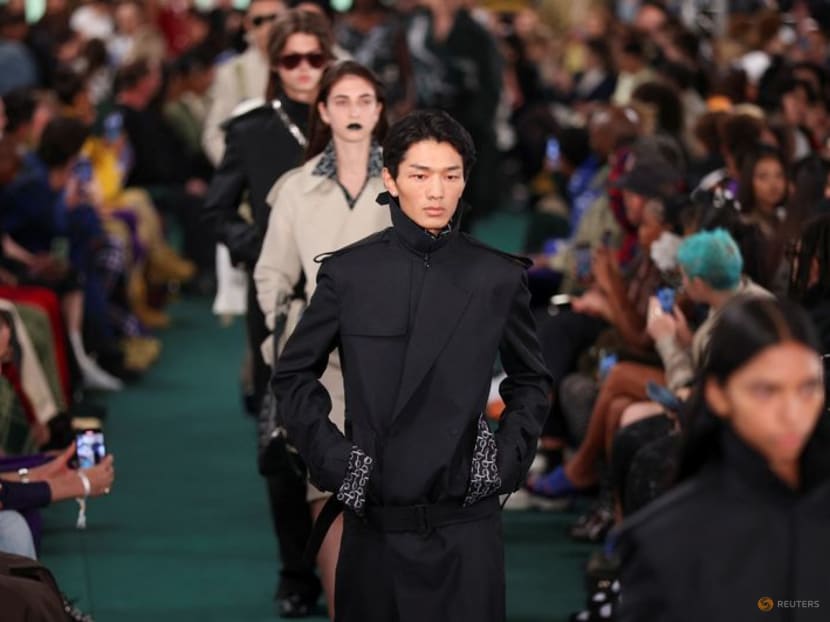 Burberry issues profit warning on luxury slowdown Burberry issues profit warning on luxury slowdown