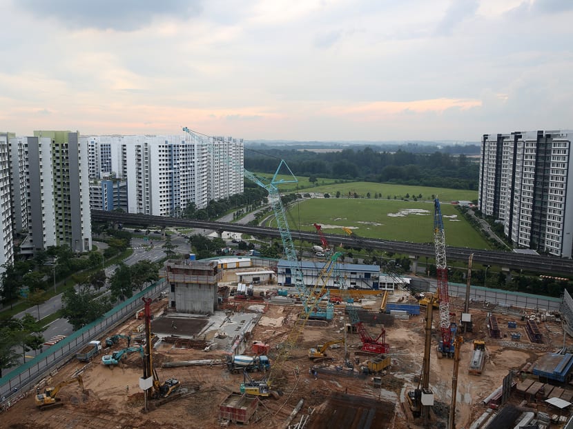 An aerial shot of a construction site in Punggol amongst HDB flats. As Punggol morphs into one of the largest housing estates in Singapore, its transport woes continue to persist unabated — so much so that some new residents are already thinking of moving out. An aerial shot of a construction site in Punggol amongst HDB flats. As Punggol morphs into one of the largest housing estates in Singapore, its transport woes continue to persist unabated — so much so that some new residents are already thinking of moving out.