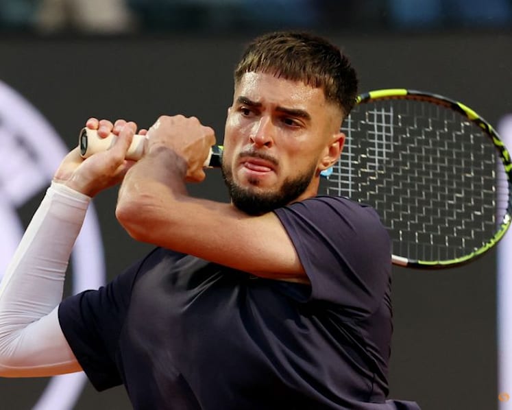 Prizmic stuns idol Djokovic at the Italian Open