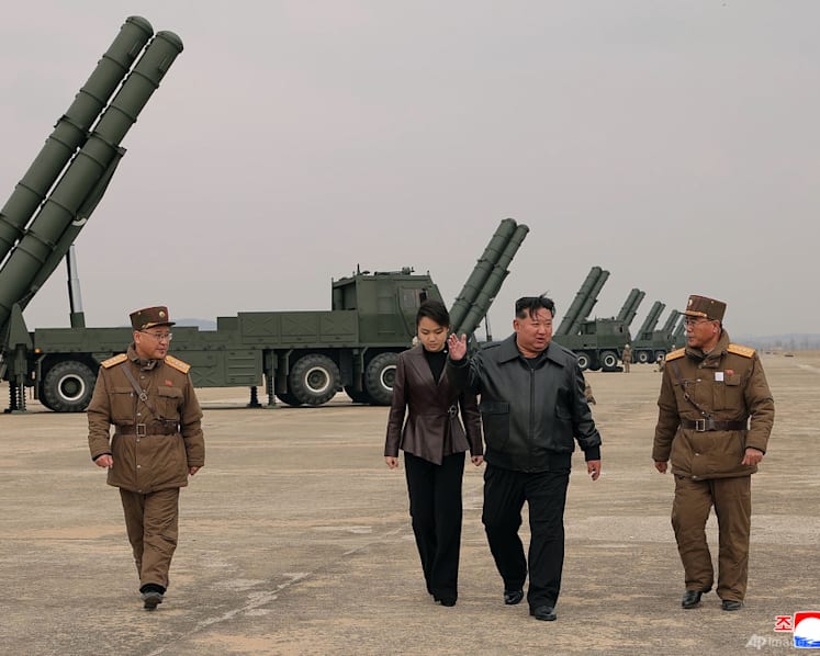 North Korean leader Kim observes test of rocket launch systems with daughter