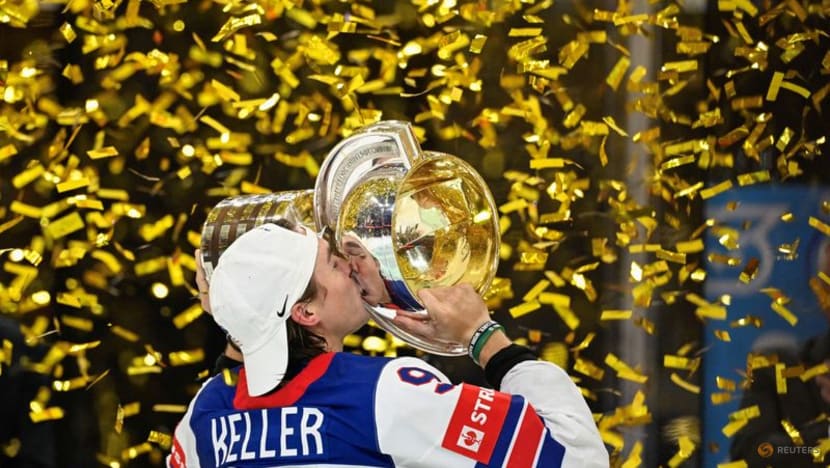 Ice hockey-Thompson ends long US wait for world championship gold