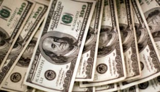 Dollar trades higher after mixed US data, but Mideast conflict keeps mood tense
