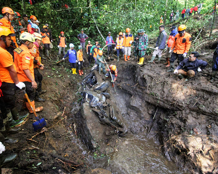 10 dead as landslide hits passing cars on Indonesia's Java island