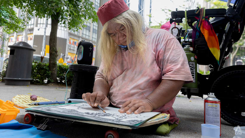 The para-athlete who once won a medal for Singapore and now sells art on the streets of Kuala Lumpur