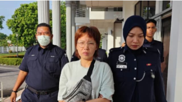 电梯内向唐氏青年泼热水 马国妇女被判坐牢十年