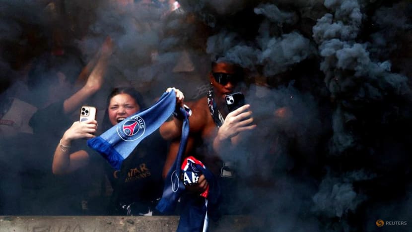 Paris erupts in euphoria before skirmishes as PSG win Champions League