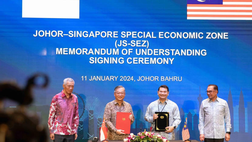 Singapore, Malaysia sign deal to set up special economic zone in Johor; passport-free access at land checkpoints being explored
