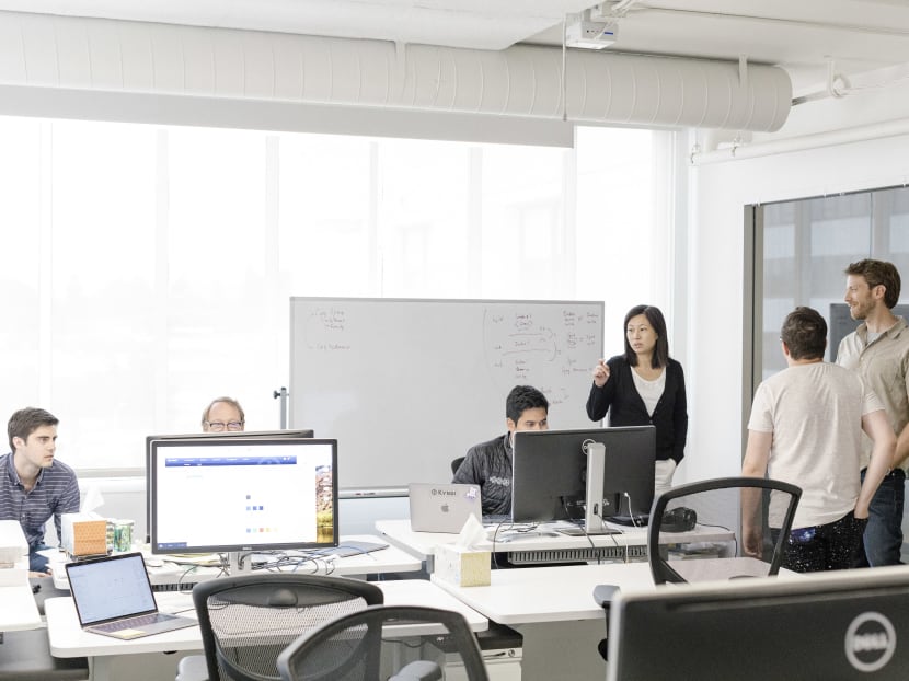 Employees of Kyndi, a Silicon Valley startup that focuses on the reasoning side of artificial intelligence, distinguishing it from the branch known as deep learning.