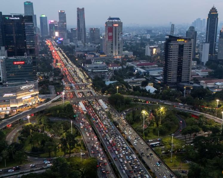 Fitch cuts Indonesia credit rating outlook to negative