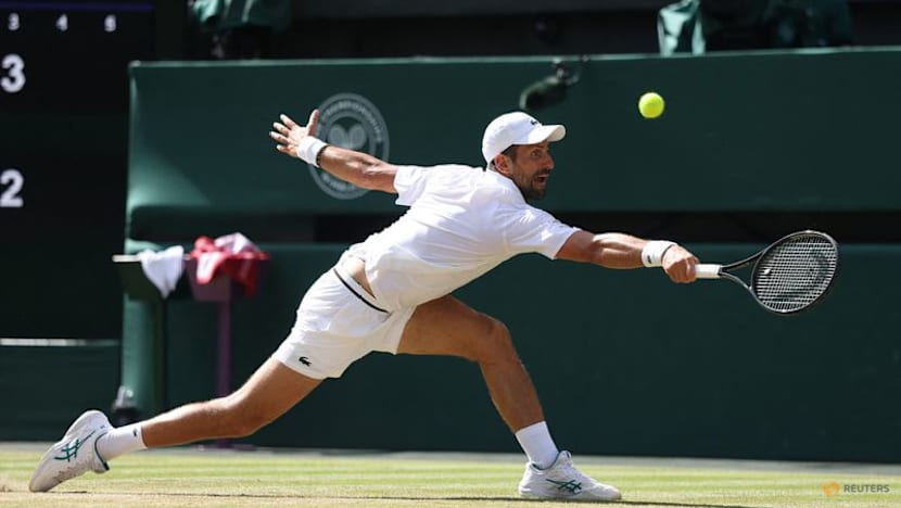 Djokovic moves past another Federer milestone to make Wimbledon quarter-finals
