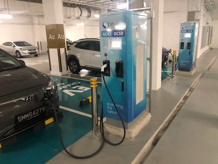 An electric-vehicle charging point at 5 Science Park Drive, which is among 200 built by utilities provider SP Group.