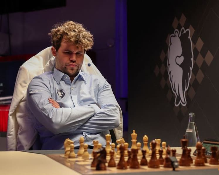 Chess-Peerless Carlsen completes fifth rapid and blitz double