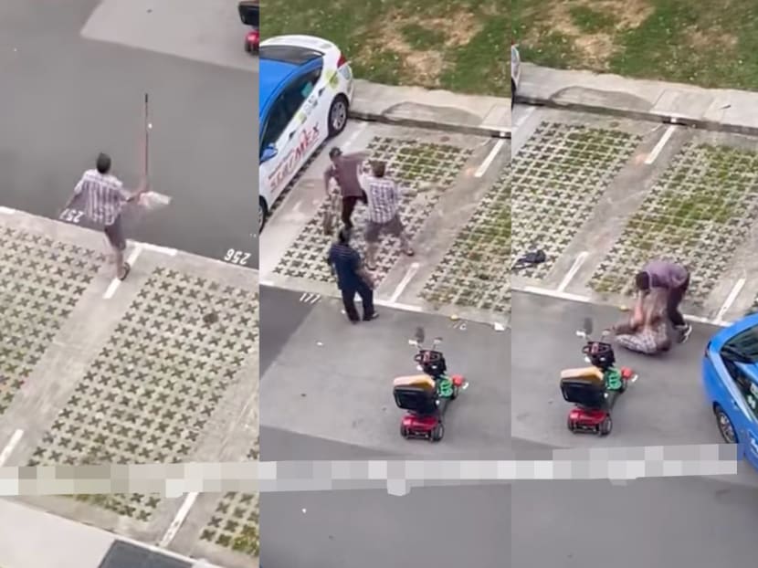 Screengrabs from a video circulating on social media showing a fight taking place at an open air car park in Hougang.