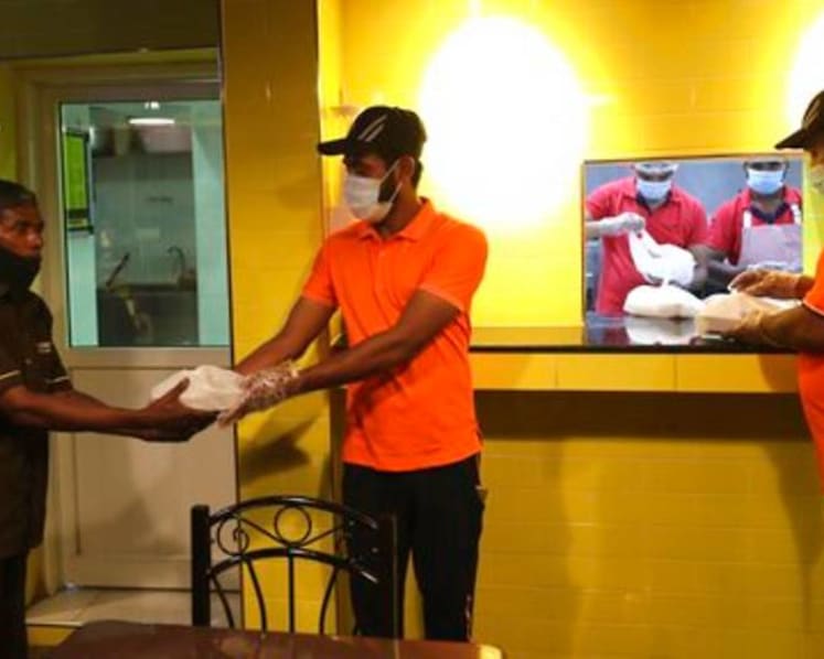 As COVID-19 impacts migrant workers in UAE, a roadside eatery feeds the hungry one meal at a time