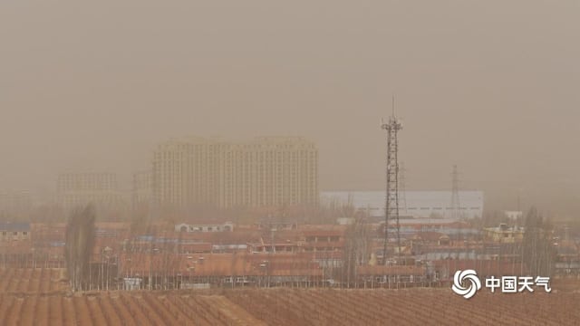 强冷空气影响北京 黄沙漫天多项活动暂停