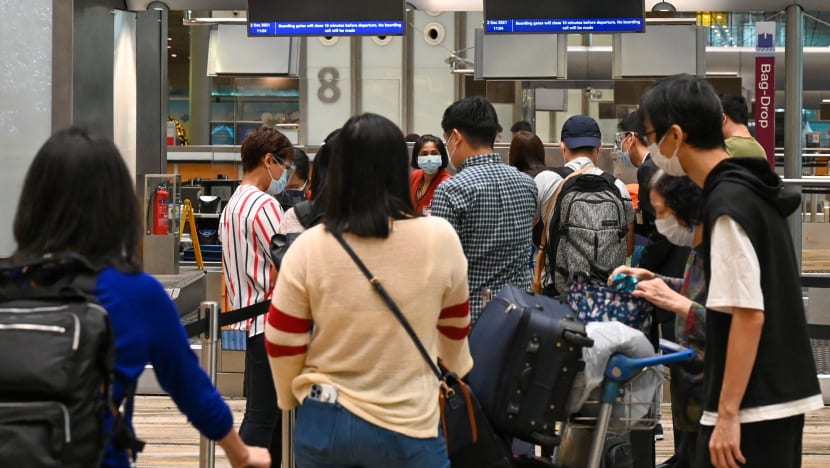As Covid-19 cases surge abroad, Singaporean travellers make adjustments to their trips, take extra precautions