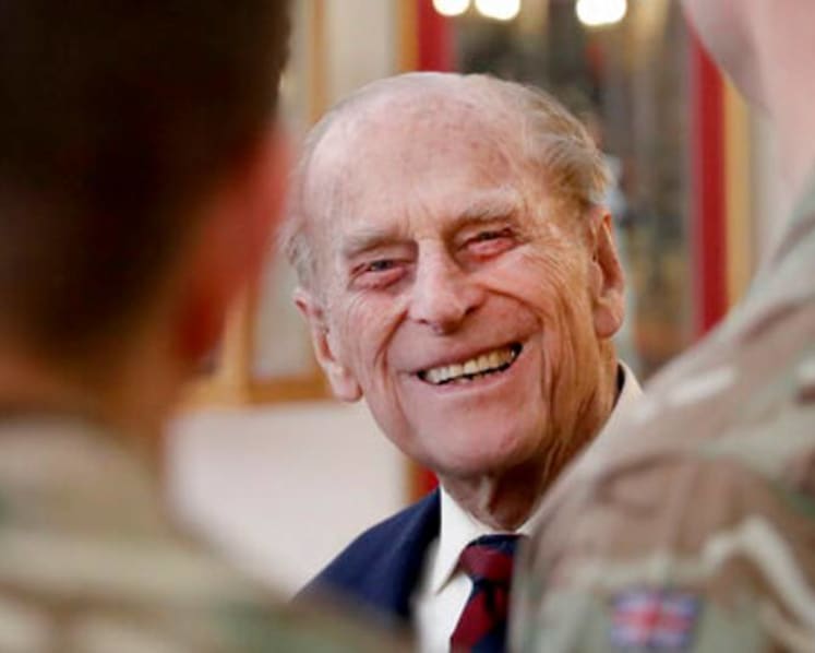 Britain's Prince Philip spends third night in hospital 