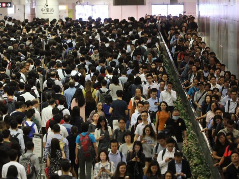 Commuters are packed into Central MTR station after a signalling failure caused a six-hour disruption on the network.