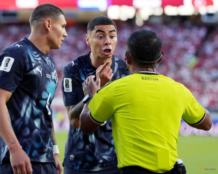 Paraguay's Almiron sent off under new FIFA 'mouth-covering' rule