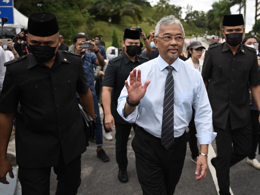 Malaysia's king, Sultan Abdullah Sultan Ahmad Shah (centre), waving after meeting with members of the media outside the National Palace in Kuala Lumpur on Nov 21, 2022. Malaysia's king, Sultan Abdullah Sultan Ahmad Shah (centre), waving after meeting with members of the media outside the National Palace in Kuala Lumpur on Nov 21, 2022.
