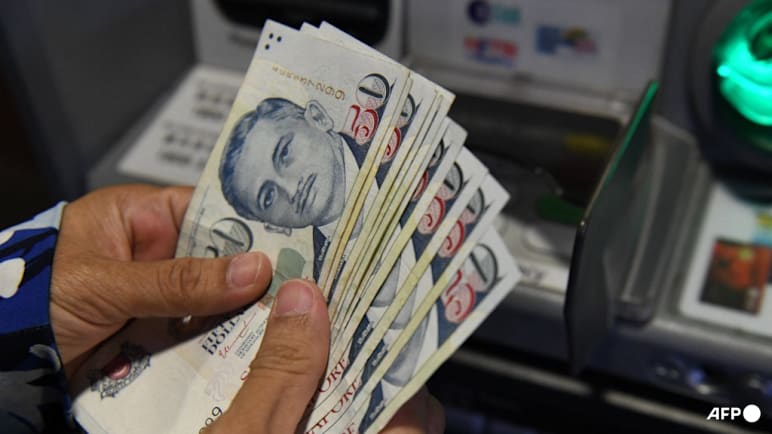 Jail for Malaysians who entered Singapore repeatedly to withdraw S$1 million in total for syndicate