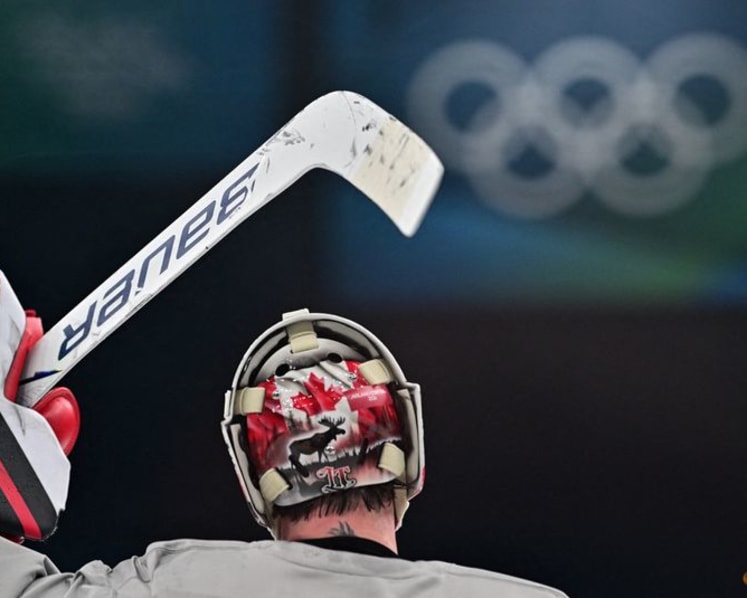 Ice hockey-Goalies show pride and personality with artistic helmets