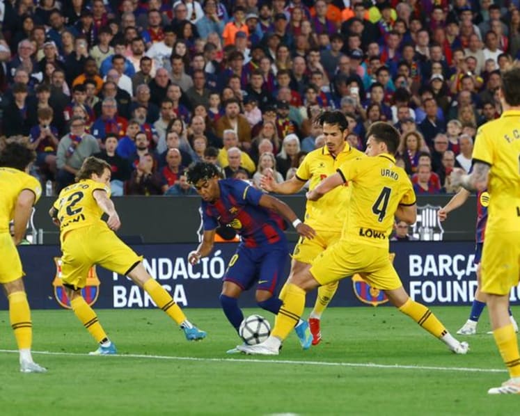 Barca beat Espanyol 4-1 to move nine points clear in LaLiga