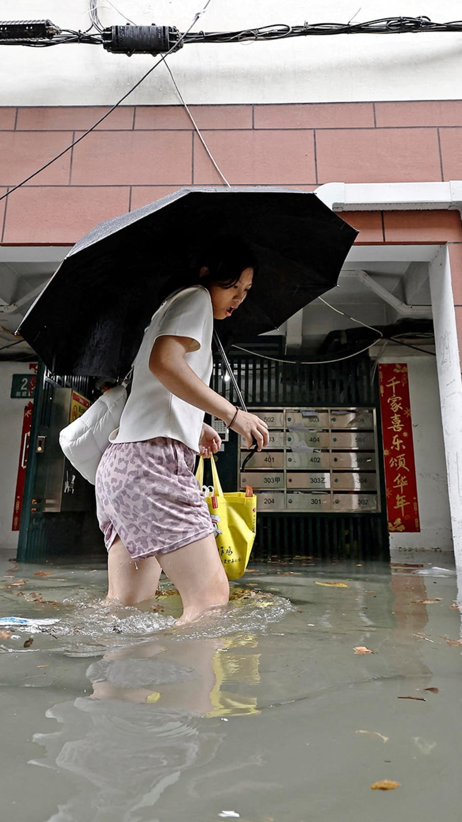 Typhoon Dolphin weakens but disrupts travel in east China