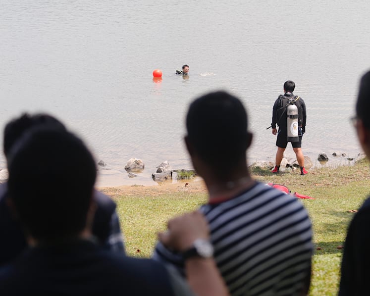 In photos: Divers search for samurai sword discarded in Lower Peirce Reservoir after attack