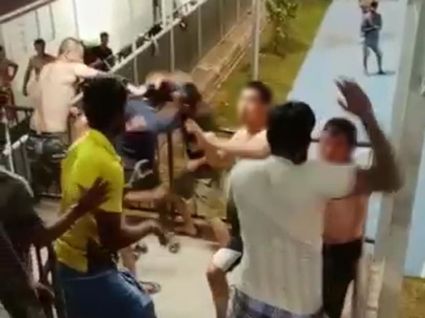 A screenshot of a video showing workers fighting and shouting at each other was circulating on WhatsApp. A screenshot of a video showing workers fighting and shouting at each other was circulating on WhatsApp.