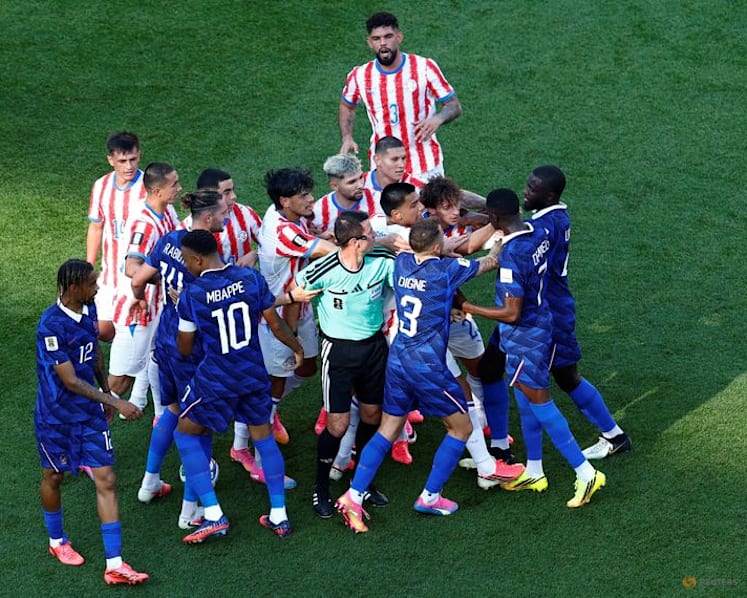 Mbappe keeps cool as France survive furnace against Paraguay