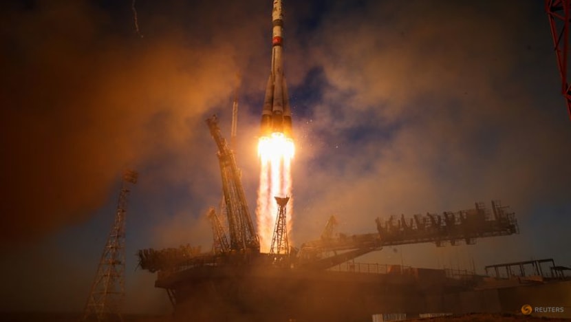 Russia sends American and two cosmonauts to space station with rare NASA chief visit