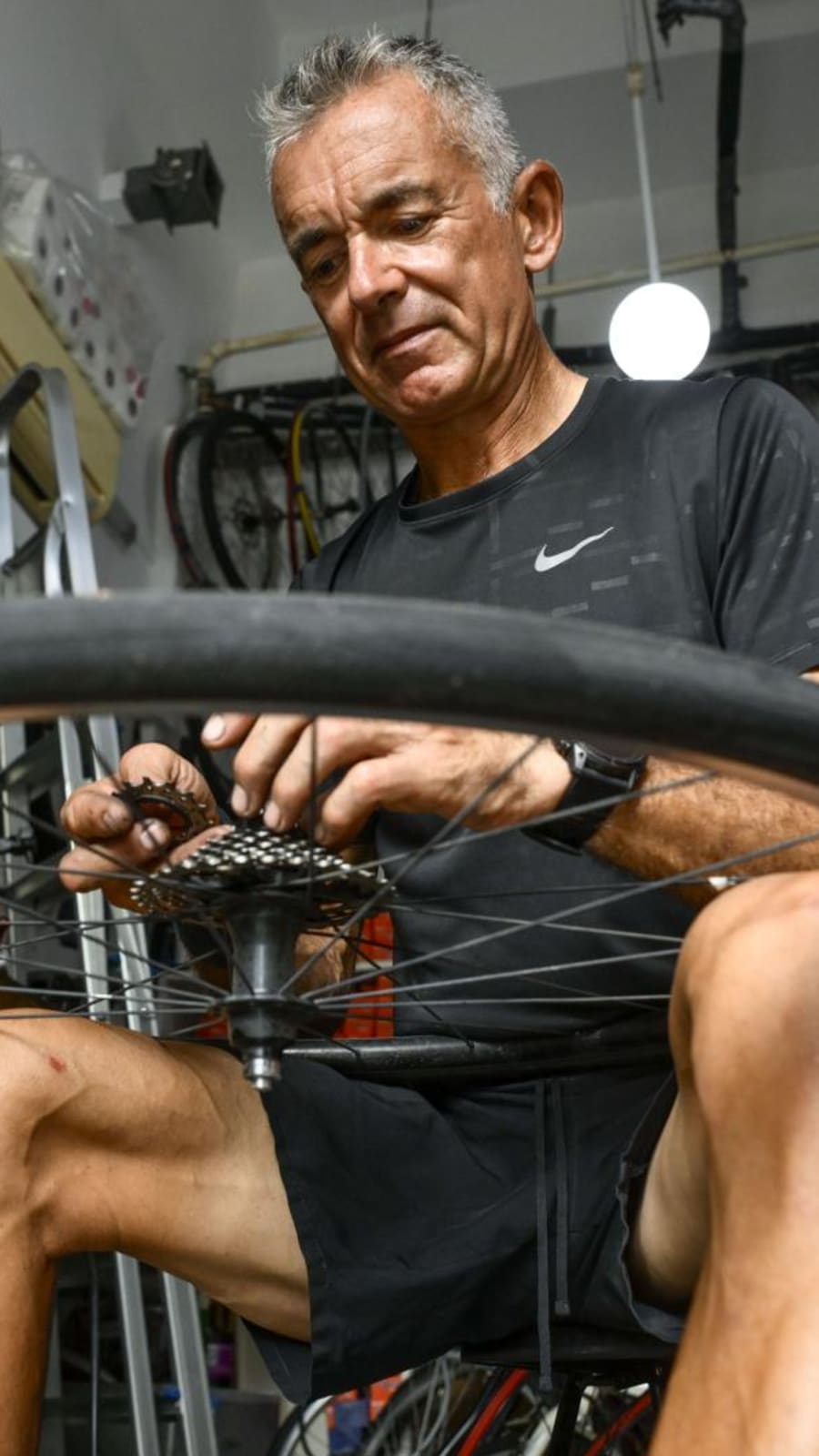 The ex-banker who repairs bikes for free