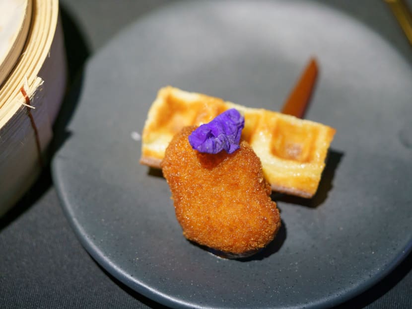 A nugget made from lab-grown chicken meat is seen during a media presentation in Singapore, the first country to allow the sale of lab-grown meat, on Dec 22, 2020. A nugget made from lab-grown chicken meat is seen during a media presentation in Singapore, the first country to allow the sale of lab-grown meat, on Dec 22, 2020.