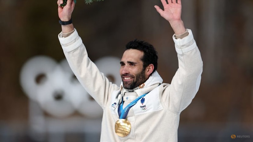 Biathlon-Sixteen years on, Fourcade finally tastes sweet Vancouver gold