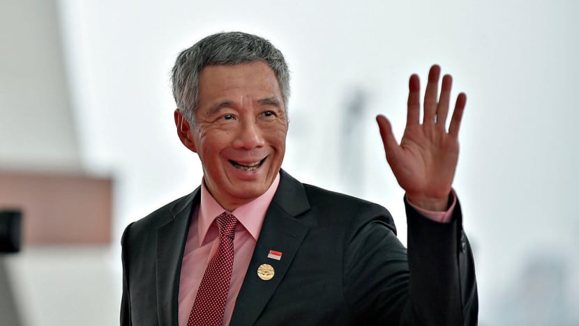 PM Lee visits Vientiane for top regional meetings