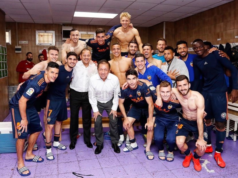Mr Peter Lim and Valencia president Anil Murthy with Valencia players in a photo taken on May 19, 2019. Mr Peter Lim and Valencia president Anil Murthy with Valencia players in a photo taken on May 19, 2019.