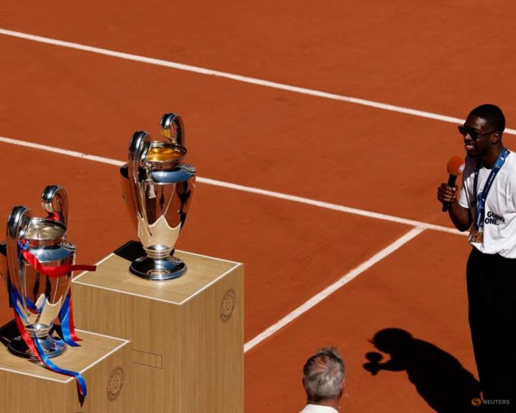 PSG players celebrate Champions League back-to-back titles with French Open crowd