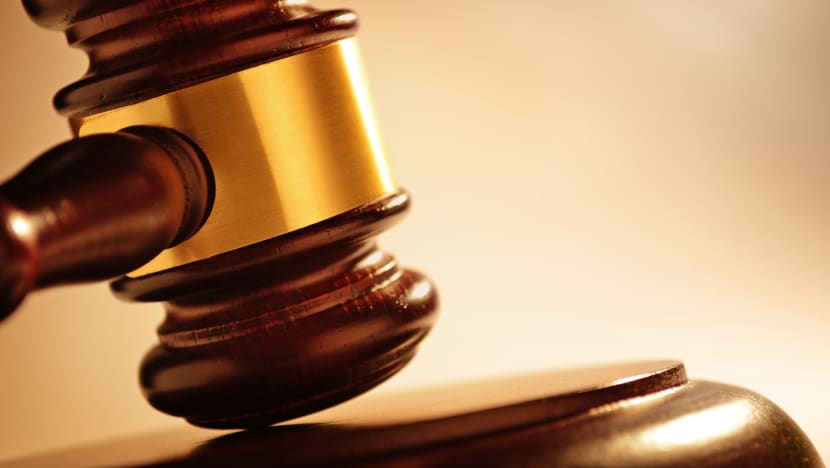 Tour organiser who sexually assaulted sleeping man in hotel room gets caning, 5.5 years' jail