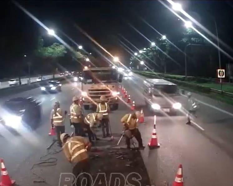 Road worker, 35, hit by lorry while dashing across PIE, taken conscious to hospital