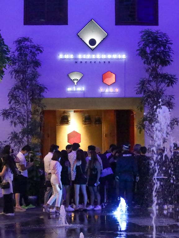 Partygoers waiting to enter Club Yang in Clarke Quay at around 11pm on April 20, 2022.