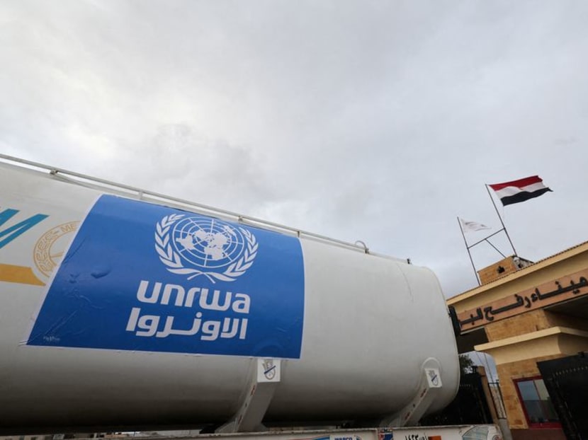 A truck, marked with United Nations Relief and Works Agency (UNRWA) logo, crosses into Egypt from Gaza, at the Rafah border crossing between Egypt and the Gaza Strip, during a temporary truce between Hamas and Israel, in Rafah, Egypt, Nov 27, 2023.