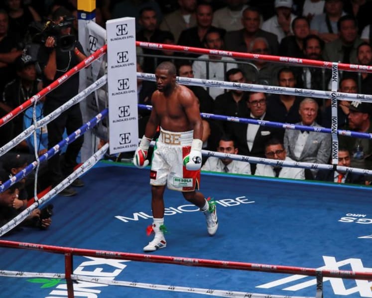 Mayweather says rematch with Pacquiao is exhibition, venue still to be decided