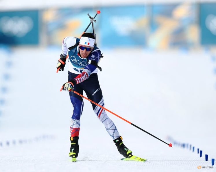 Biathlon-Fillon Maillet storms to gold for France in 'perfect race'