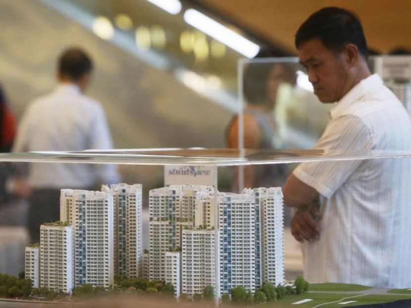 A man looking at a model of new flats at Northshore Straitsview in Punggol, at HDB Hub at Toa Payoh on 17 March, 2016. Photo: Ooi Boon Keong/TODAY A man looking at a model of new flats at Northshore Straitsview in Punggol, at HDB Hub at Toa Payoh on 17 March, 2016. Photo: Ooi Boon Keong/TODAY