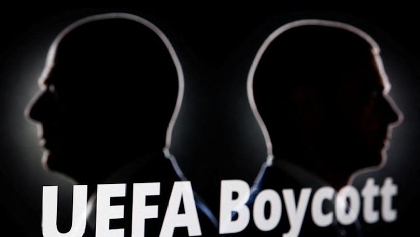 Reaction to UEFA vote to boycott World Cup over FIFA stake sale plans