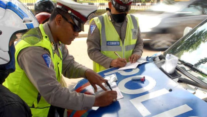 Peraturan baru berkendara: Tilang sistem poin hingga SIM dicabut