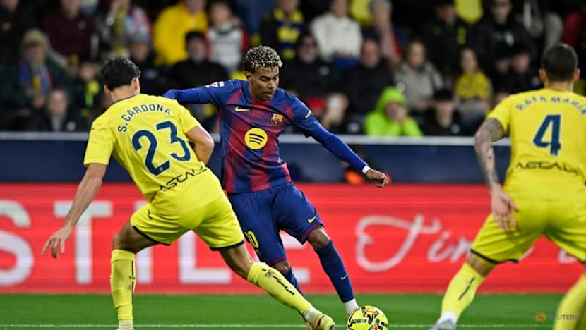 Yamal strikes as Barcelona punish 10-man Villarreal